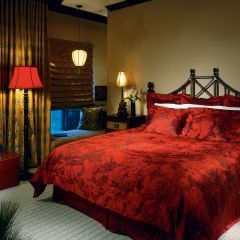 deep red bedroom decor in Dallas suite